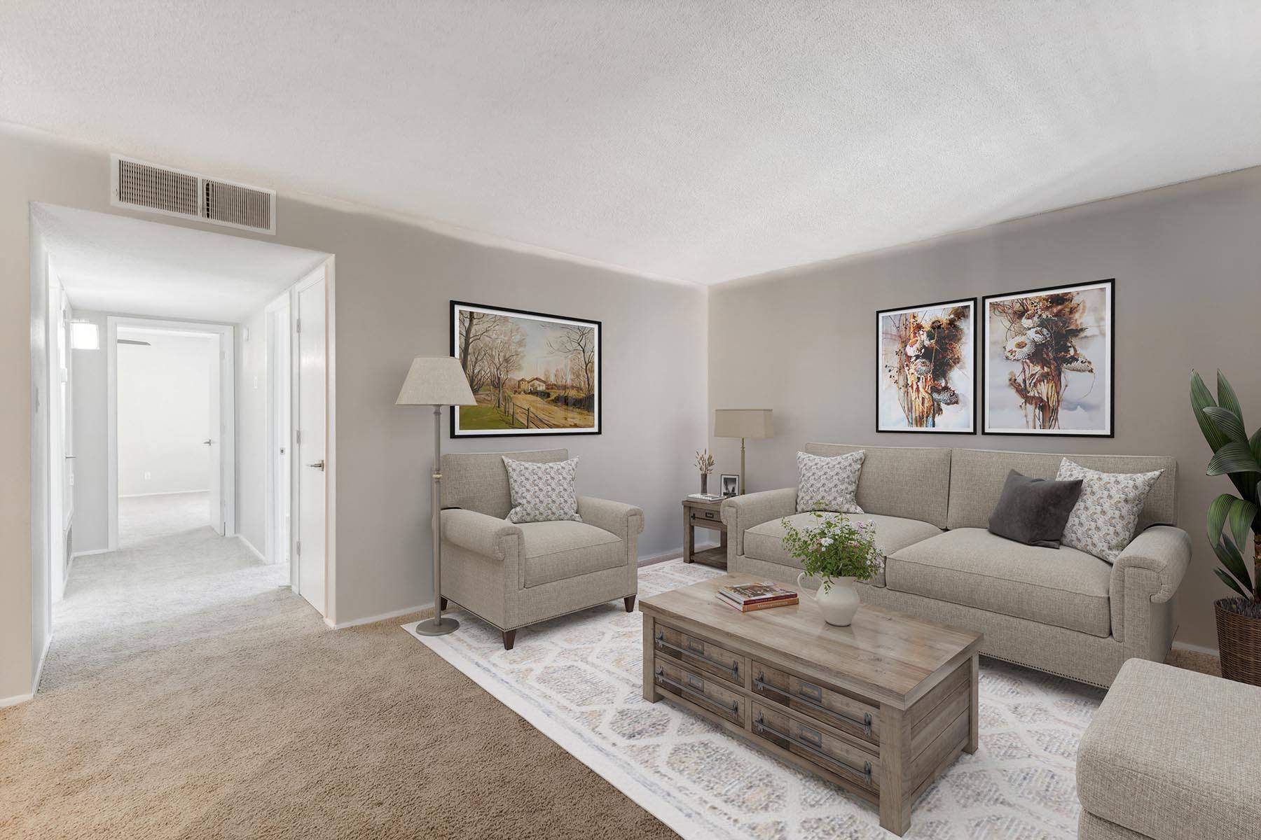 a living room with a couch and a coffee table